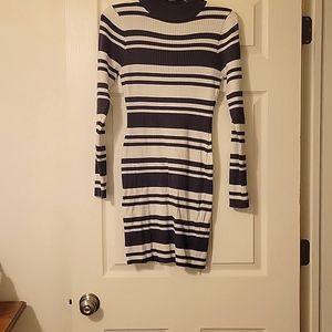 Tight fitted dress, size XL but fits like M. Say What brand